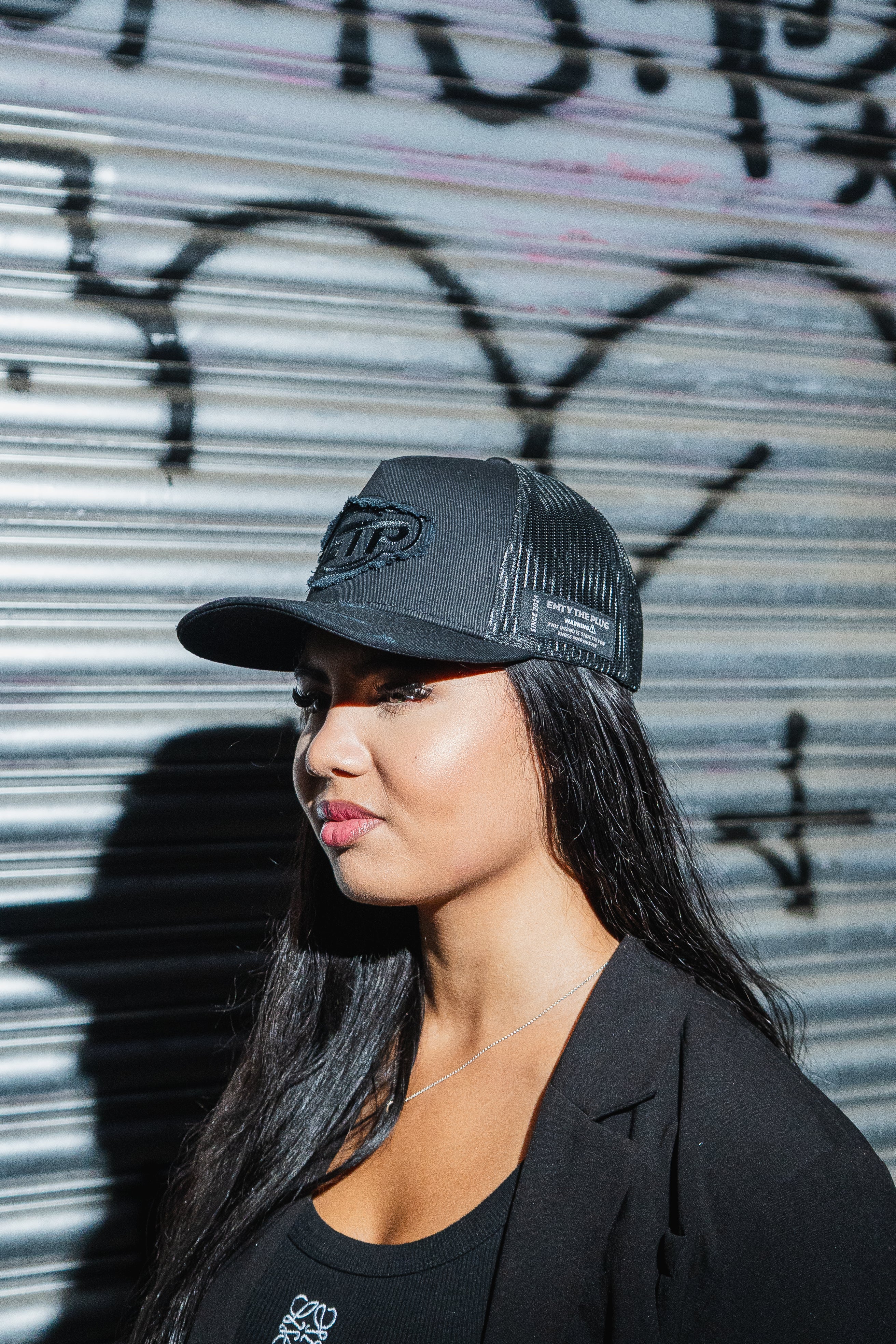 Black trucker cap