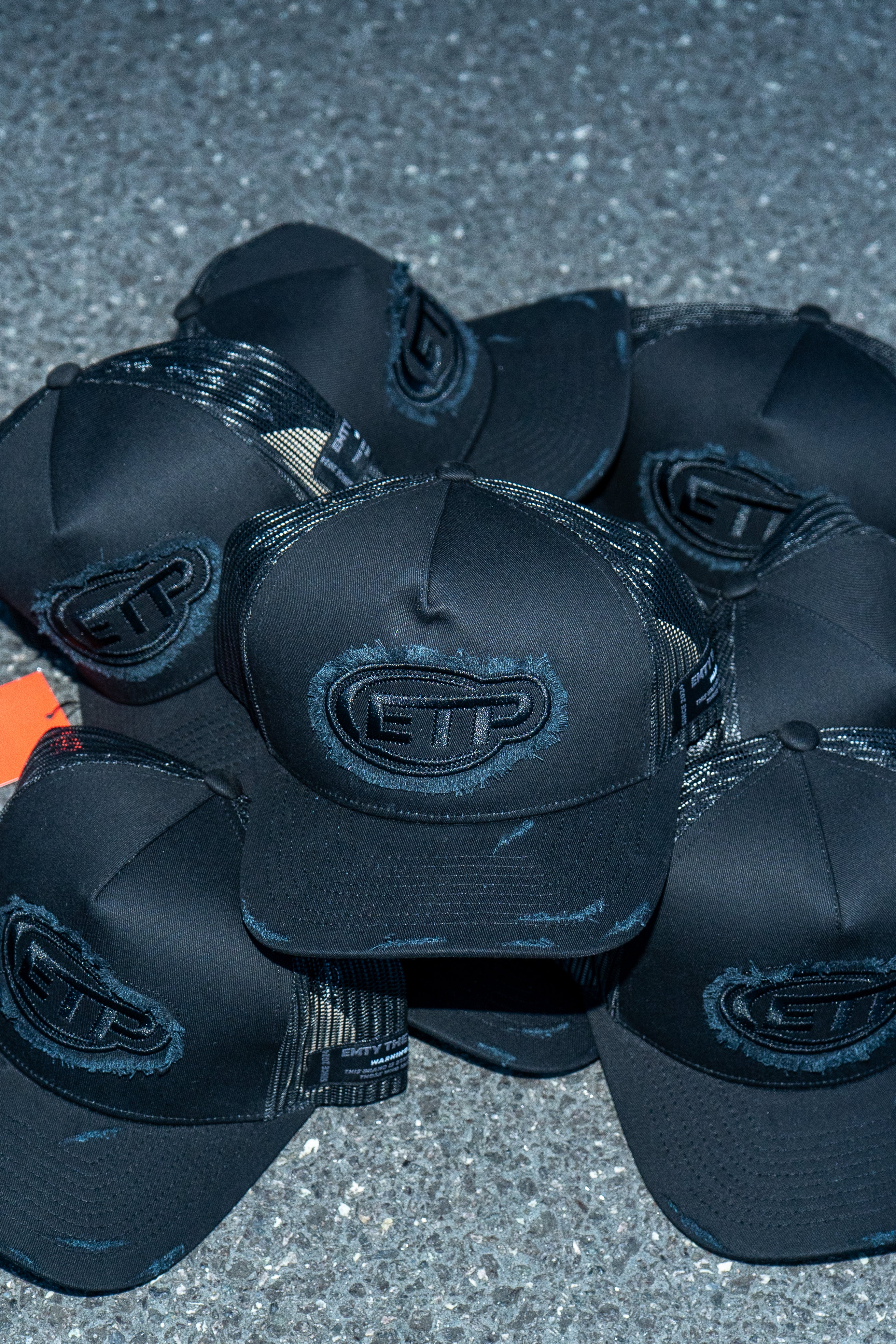 Black trucker cap